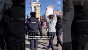 Russian Man Fined For ‘Hug If You’re Against the War’ Sign