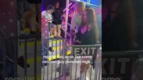 Megan Fox gets slammed into barricade as man tries to punch Machine Gun Kelly at fair #shorts
