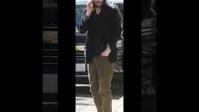 Keanu Reeves 59 rocks a casual look and shaggy beard as he goes Black Friday shopping at Louis