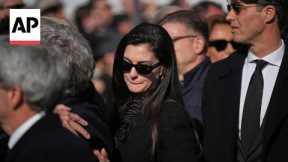 Anne Hathaway and other stars attend Valentino Garavani's funeral service