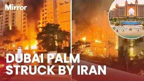 Chaos unfolds as Dubai's Fairmont Hotel erupts into flames after 'missile attack' on The Palm